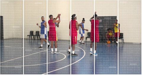 Youth basketball team practicing on indoor court passing, shooting, and defending drills