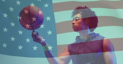 Basketball player showcasing patriotism with ball and flag
