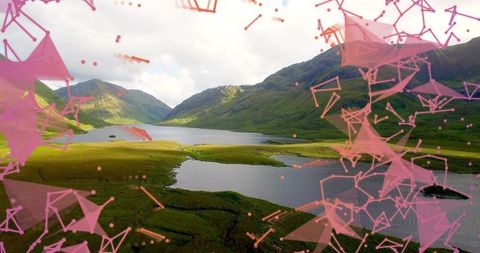 Drone framing loch and grassy peninsula reflecting sunlight with pink geometric overlay