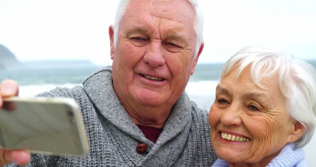 Senior Couple Taking Selfie By the Ocean - Download Free Stock Images Pikwizard.com