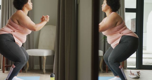 Woman doing squats at home in exercise outfit. Concept of healthy living, maintaining fitness, and self-motivation. Useful for themes involving home workouts, body positivity, and active lifestyle.