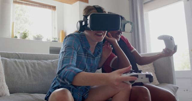 Two Friends Enjoying Virtual Reality Game in Living Room - Download Free Stock Images Pikwizard.com