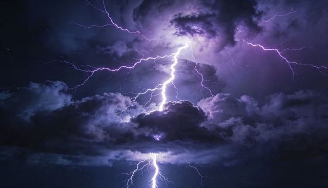 Violet Lightning Cracking Through Towering Cumulonimbus Clouds, Dramatic Storm Energy