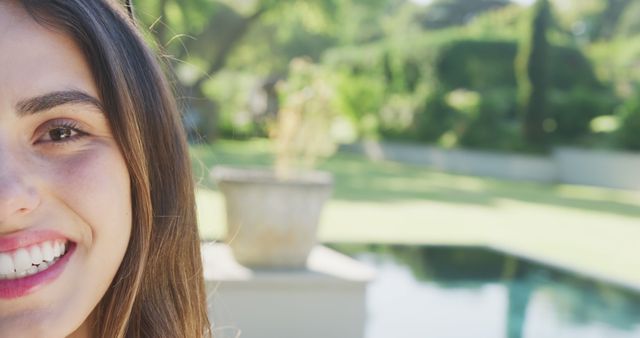 Close-Up of Woman Smiling Outdoors in Sunlight - Download Free Stock Images Pikwizard.com