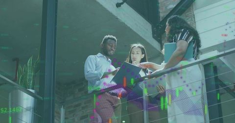 Business Team Analyzing Data Graphs with Tablet on Mezzanine