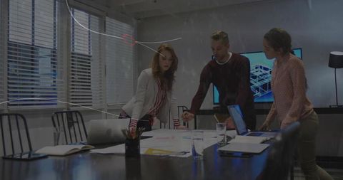 Architects Collaborating in Modern Office Environnt