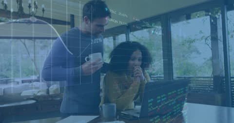 Diverse Team Analyzing Financial Data During Collaborative Meeting