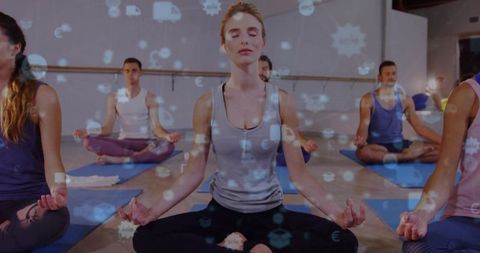 Group Meditation in Yoga Studio with Digital Wellness Overlay