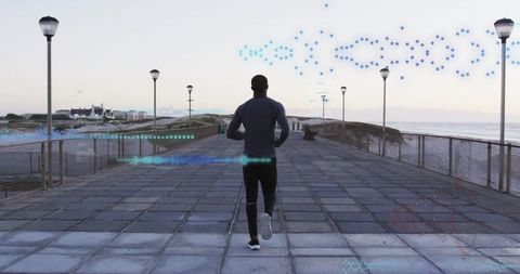 Athlete Jogging on Promenade along Waterfront at Dawn