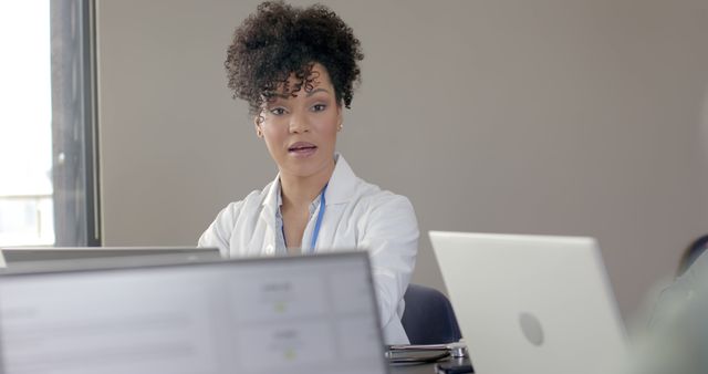 Confident Businesswoman in White Office Attire Doing Presentation - Download Free Stock Images Pikwizard.com