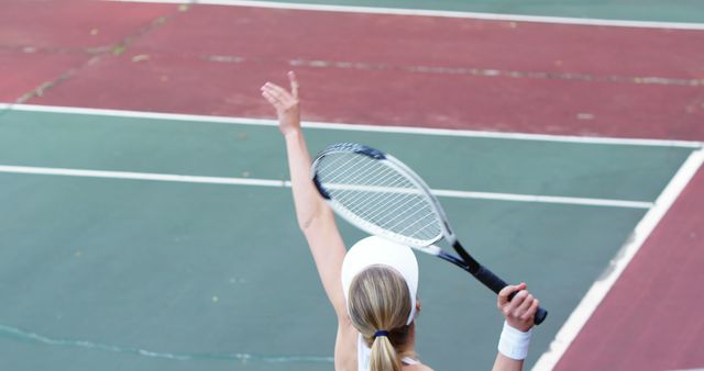 Active sportswoman playing tennis in tennis court - Download Free Stock Photos Pikwizard.com