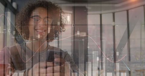 Cheerful Entrepreneur Analyzing Data Statistics Over Smartphone