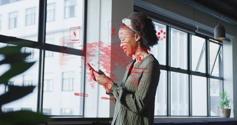 Woman in office with ar digital security interface overlay