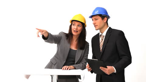 Architects Discussing Construction Plans on White Background