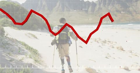 Adventurous hiker with prosthetic leg trekking sandy beach with red trend chart overlay