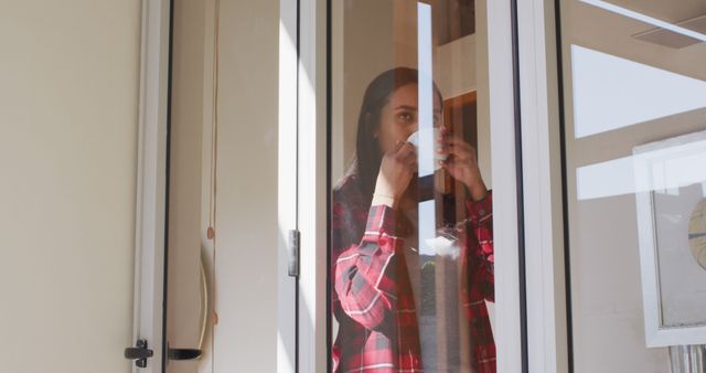 Woman Drinking Coffee at Home Looking Through Window - Download Free Stock Images Pikwizard.com