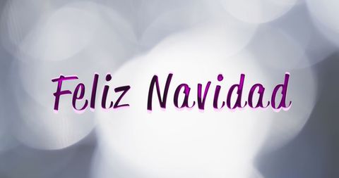 Feliz Navidad Text with Festive Bokeh Background