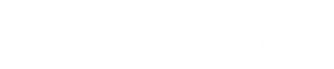 Love is in the air text in white font on transparent background