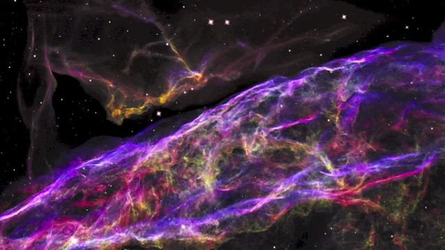 Beautiful view of Veil Nebula by Hubble Space Telescope. Captures intricate filaments from a star explosion. Great for educational resources, astrophotography enthusiasts, science presentations, and space-themed decors.