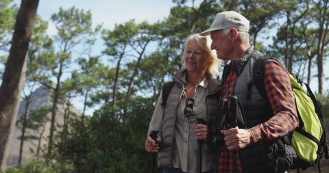 Senior Couple Hiking in Mountain Forest on Sunny Day - Download Free Stock Images Pikwizard.com