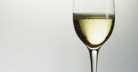 Elegant champagne glass symbolizes celebration and luxury