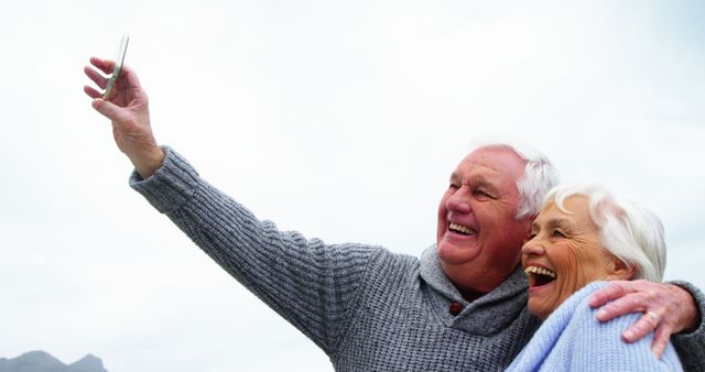 Senior Couple Smiling and Taking a Selfie Outdoors - Download Free Stock Images Pikwizard.com