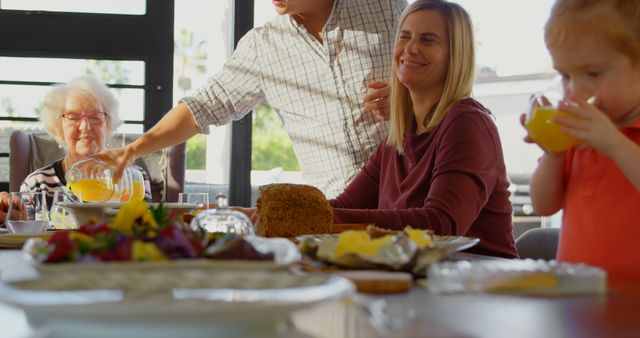 Multi-generational Family Enjoying Breakfast Together - Download Free Stock Images Pikwizard.com