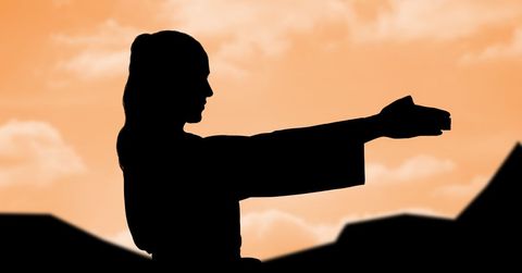 silhouette of woman practicing yoga at sunset with sky background - Download Free Stock Templates Pikwizard.com