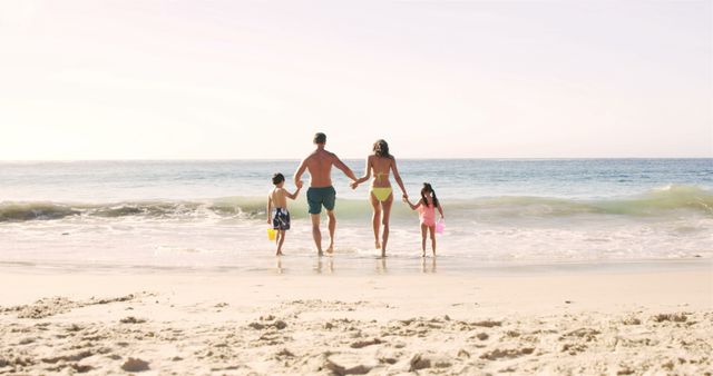 Family Enjoying Time Together on Sunny Beach - Download Free Stock Images Pikwizard.com