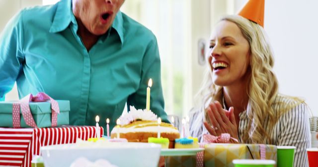 Joyful Birthday Party Celebration with Cake and Candles - Download Free Stock Images Pikwizard.com