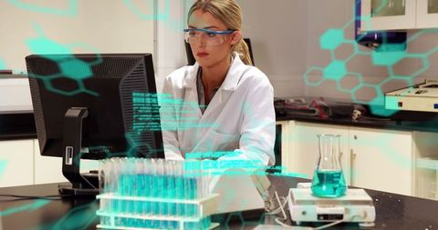 Female Scientist Analyzing Data in Lab with Modern Technology Interface - Download Free Stock Images Pikwizard.com