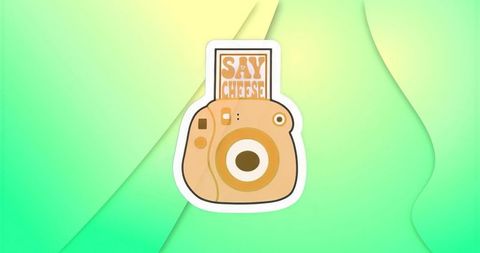 Retro instant camera icon on green background