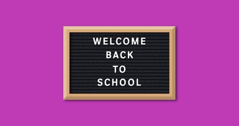 Welcome Back to School Sign on Purple Background - Download Free Stock Images Pikwizard.com