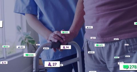 Nurse Assisting Senior With Social Media Metrics in Healthcare Facility