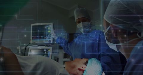 Surgeons analyzing vital signs monitors with holographic technology overlay