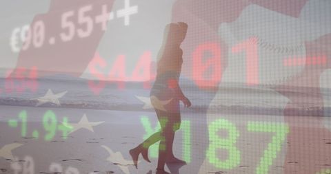 Couple Walking on Beach with Stock Market Overlay