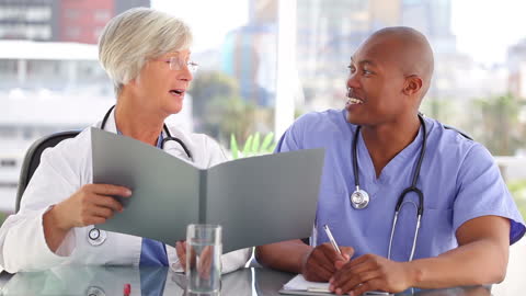 Diverse Medical Team Collaborating in Modern Office Environment