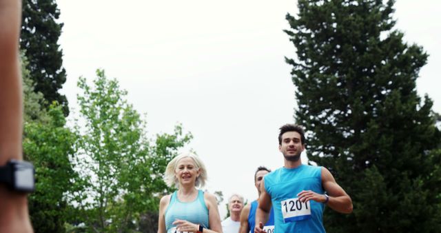 Group of Marathon Runners Participating in Outdoor Race - Download Free Stock Images Pikwizard.com