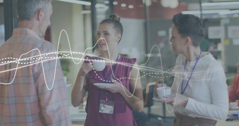 Colleagues sipping coffee and networking in open-plan workspace with waveform overlay