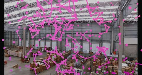 Warehouse with magenta network overlay depicting logistics innovation