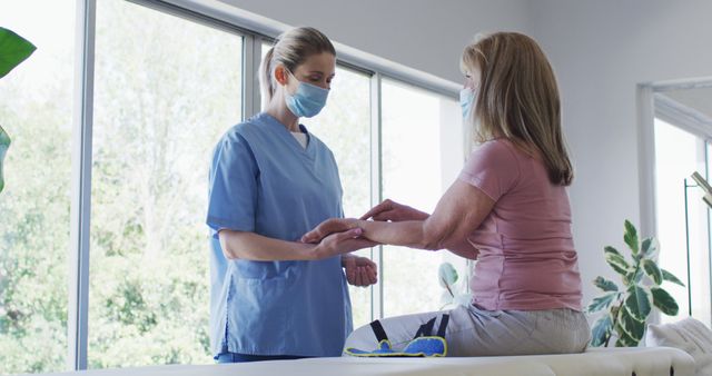 Healthcare Professional Attending to Patient in Medical Clinic - Download Free Stock Images Pikwizard.com