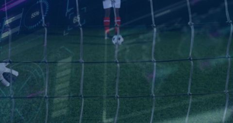 Athlete Balancing Soccer Ball on Natural Turf Near Goal