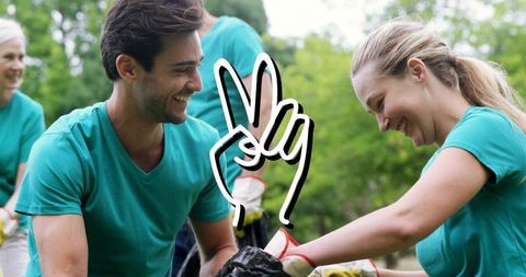 Smiling volunteers doing park cleanup with peace sign graphic, teamwork and community