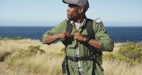 Outdoor Adventure Enthusiast in Majestic Coastal Scenery