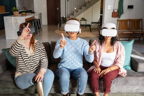Diverse Friends Experiencing Virtual Reality in Modern Living Room