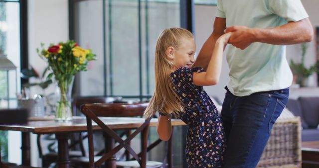 Father and Daughter Dancing in Living Room Enjoys Quality Family Time - Download Free Stock Images Pikwizard.com