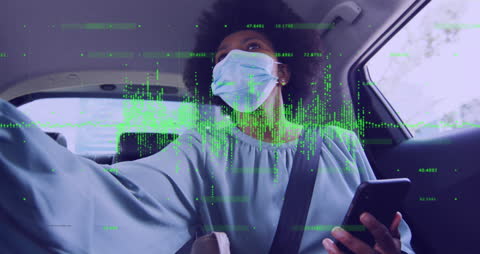 Woman with Mask Analyzing Financial Data in Car Amid Pandemic