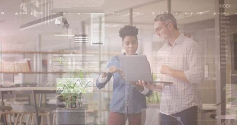 Business Colleagues Analyzing Data with Floating Graphic Elements