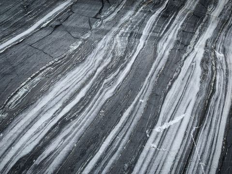 Black and white striped natural stone texture