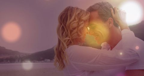 Romantic Couple Embracing with Heartfelt Joy on Beach